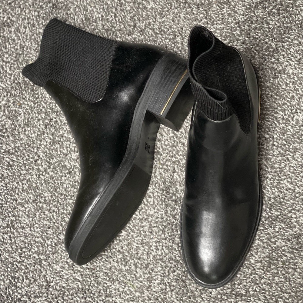black leather Zara booties w slip on sock top and gold insert in heel